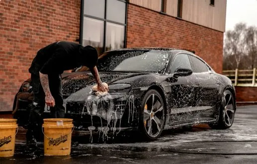 Hand washing a car
